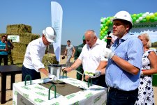 Laying the foundation stone for the construction of Olgino dairy